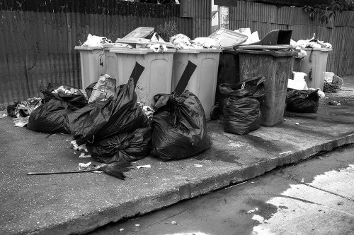 Construction site with debris being cleared by professionals